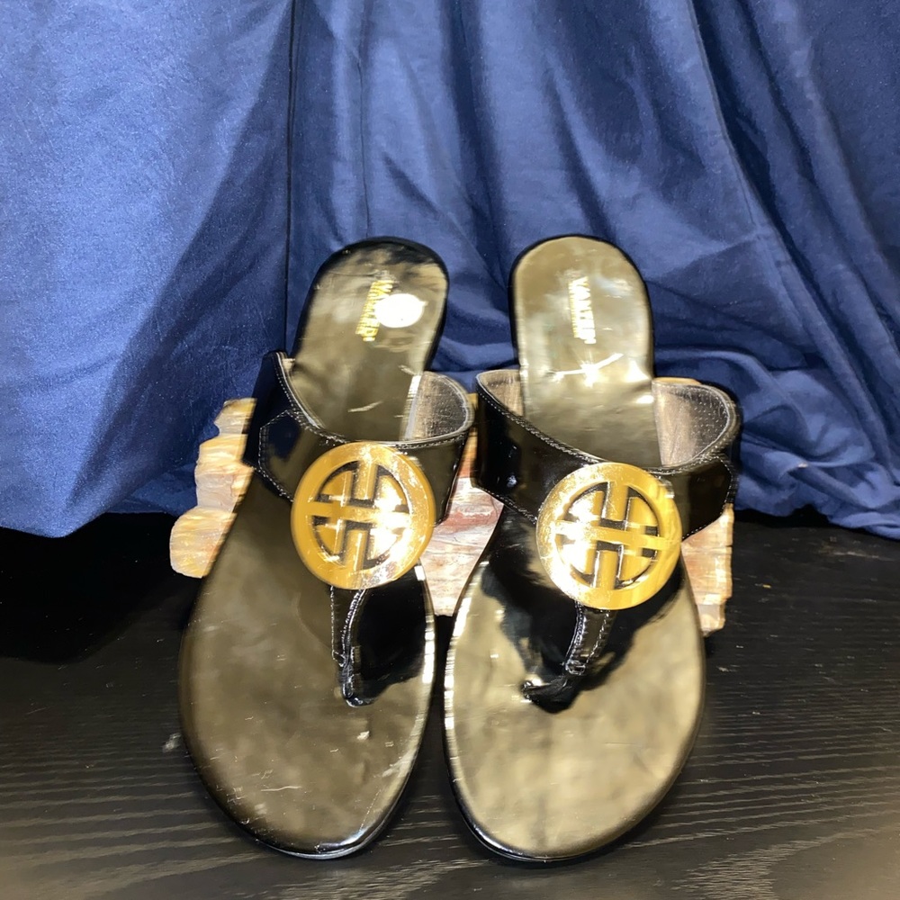 WANTED- Medallion Flip-Flop